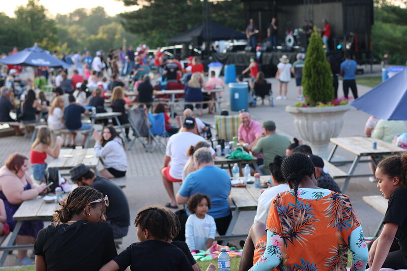 Families gathered on the outdoor grounds at Bingemans for a catered event